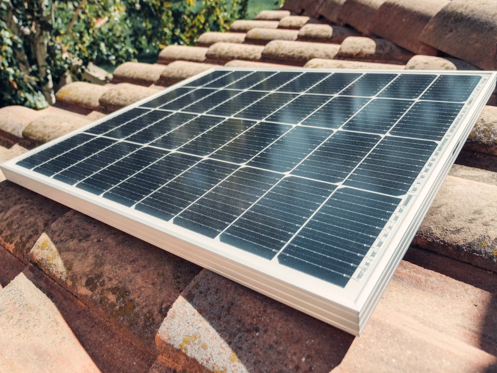 Solar Panel on Roof Tiles representing the maximum size of domestic solar system uk