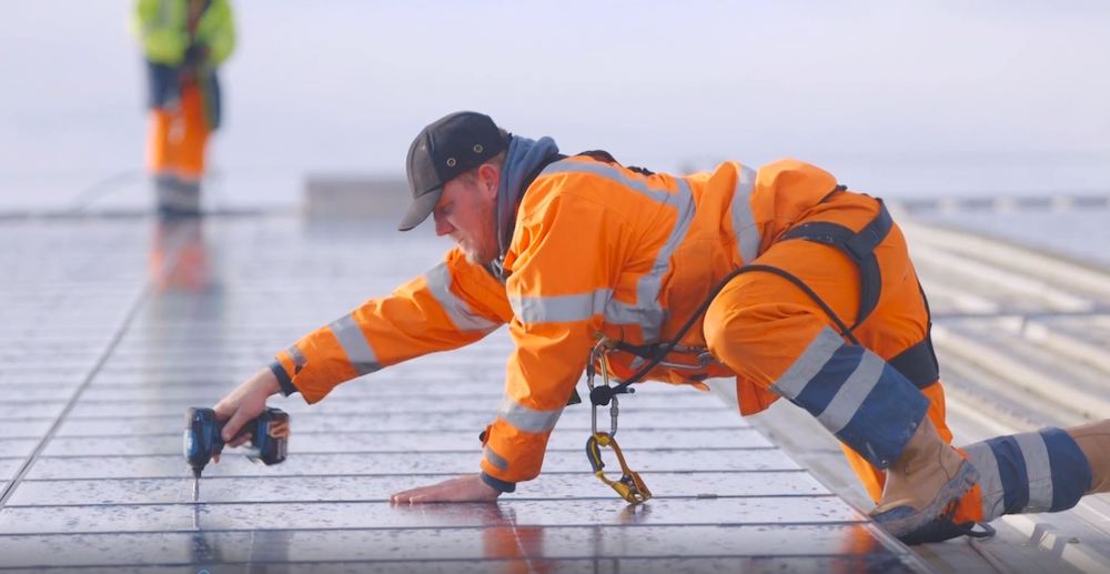 engineer maintaining a solar pv system