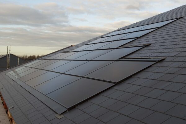 solfit intergrated solar panel on a dark roof