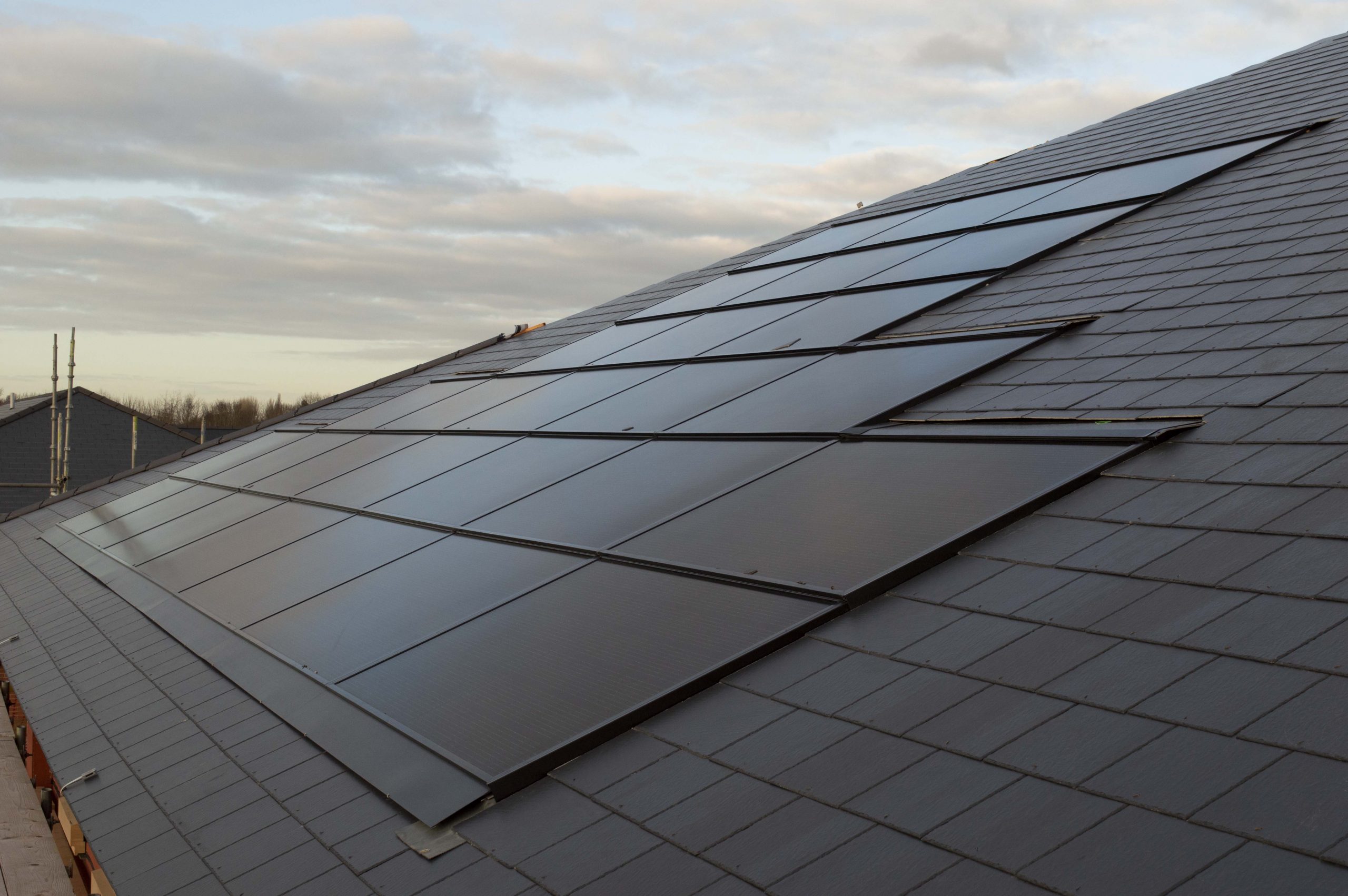 solfit intergrated solar panel on a dark roof