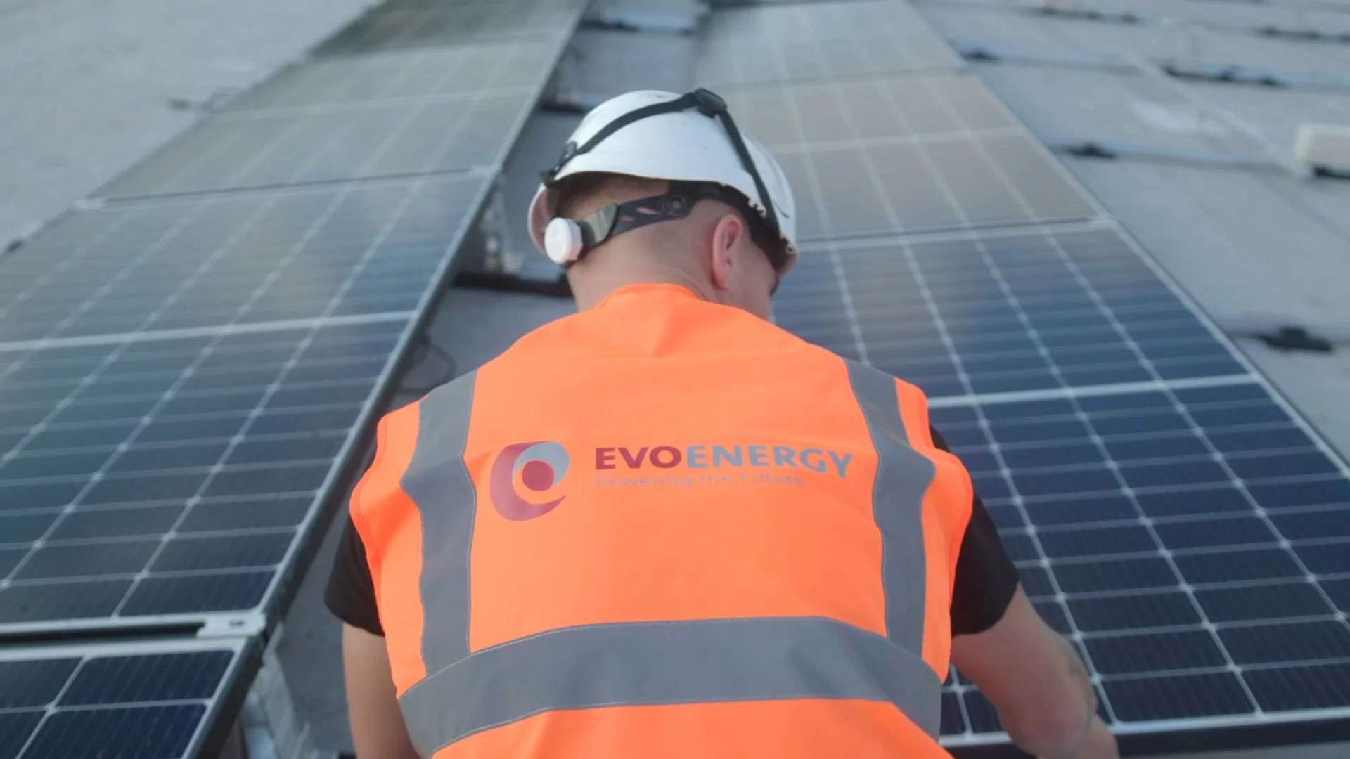 EvoEnergy Staff installing a solar panel