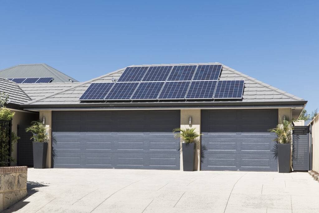 Facade of a Garage with Solar Panels on the Roof