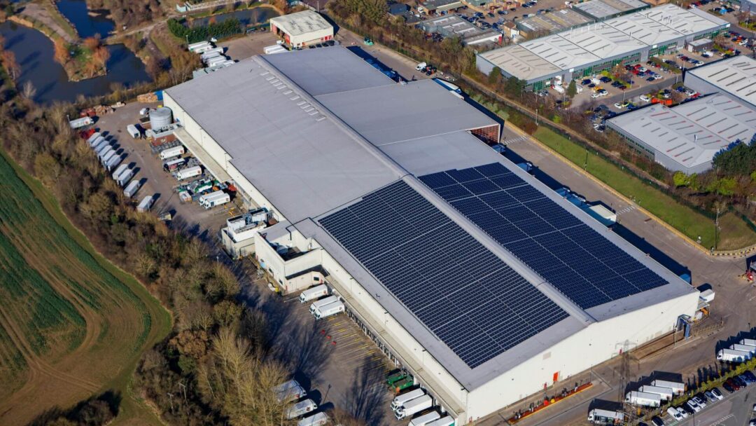block of solar panels on one side of a building