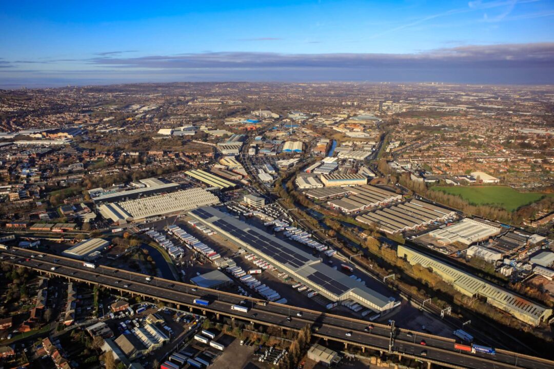 solar panels on roof next to main road