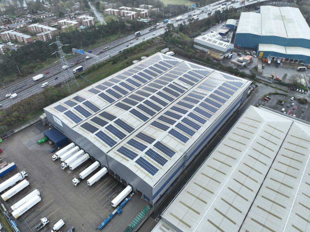 Sun-captured energy innovation crowning a food storage warehouse.