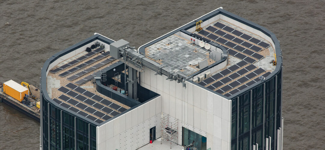 solar panels on top of a hotel roof